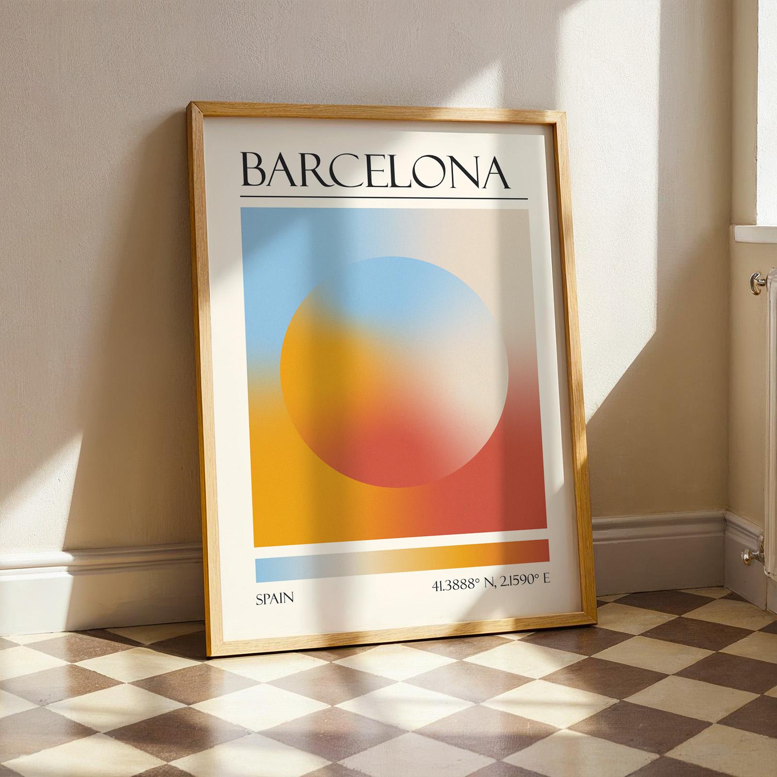 A framed print with the word "BARCELONA" at the top. The modern location artwork features orange, red and teal in an abstract style as colours of Barcelona. The bottom of the print reads "SPAIN" and includes