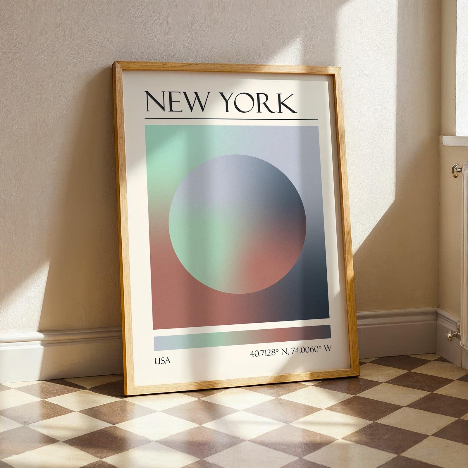 A framed print with the word "NEW YORK" at the top. The modern location artwork features orange, red and teal in an abstract style as colours of New York. The bottom of the print reads "USA" and includes coordinates.