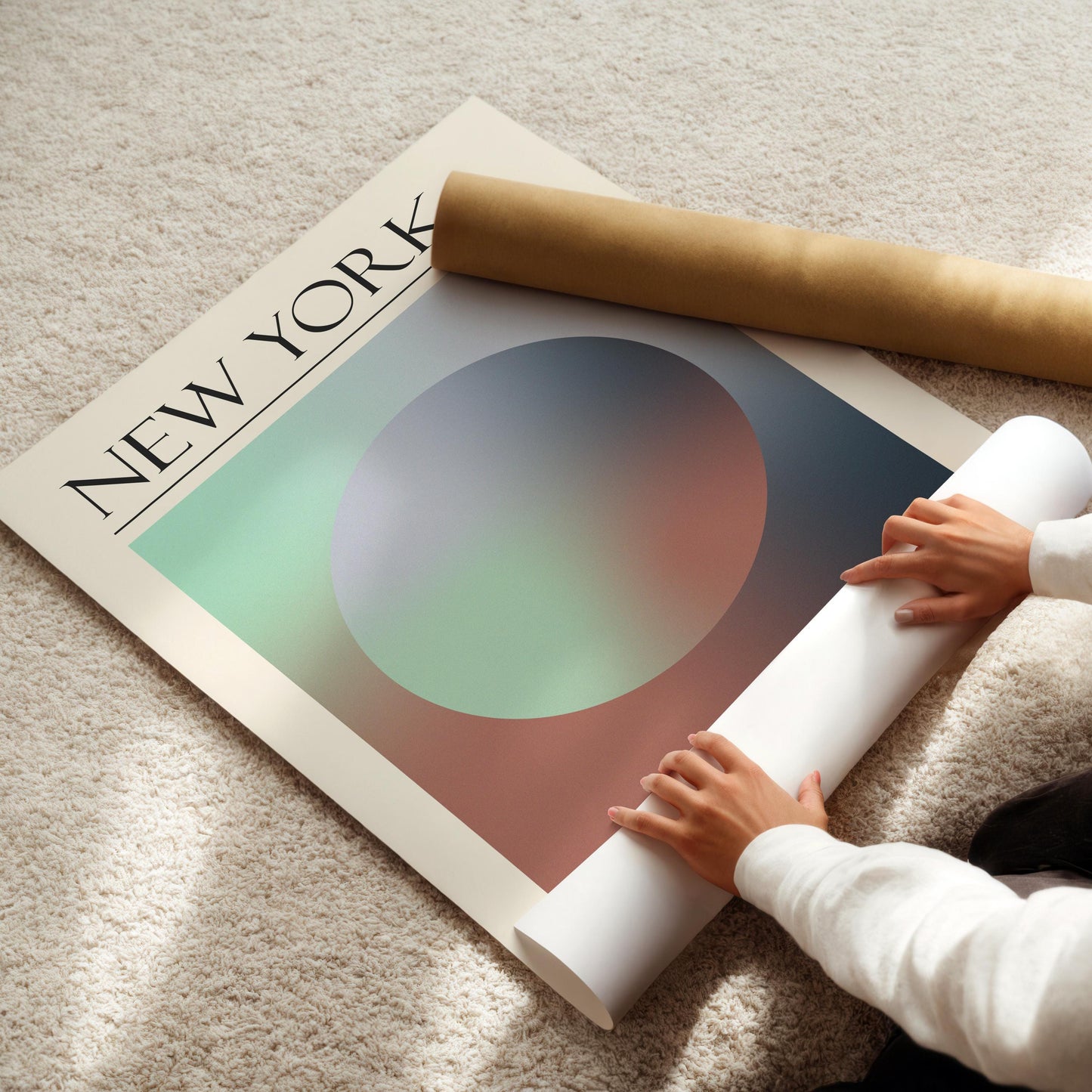 A rolled-up white poster and a brown cardboard tube are also visible. The travelling inspired print is for lovers of spiritual design and calm art.