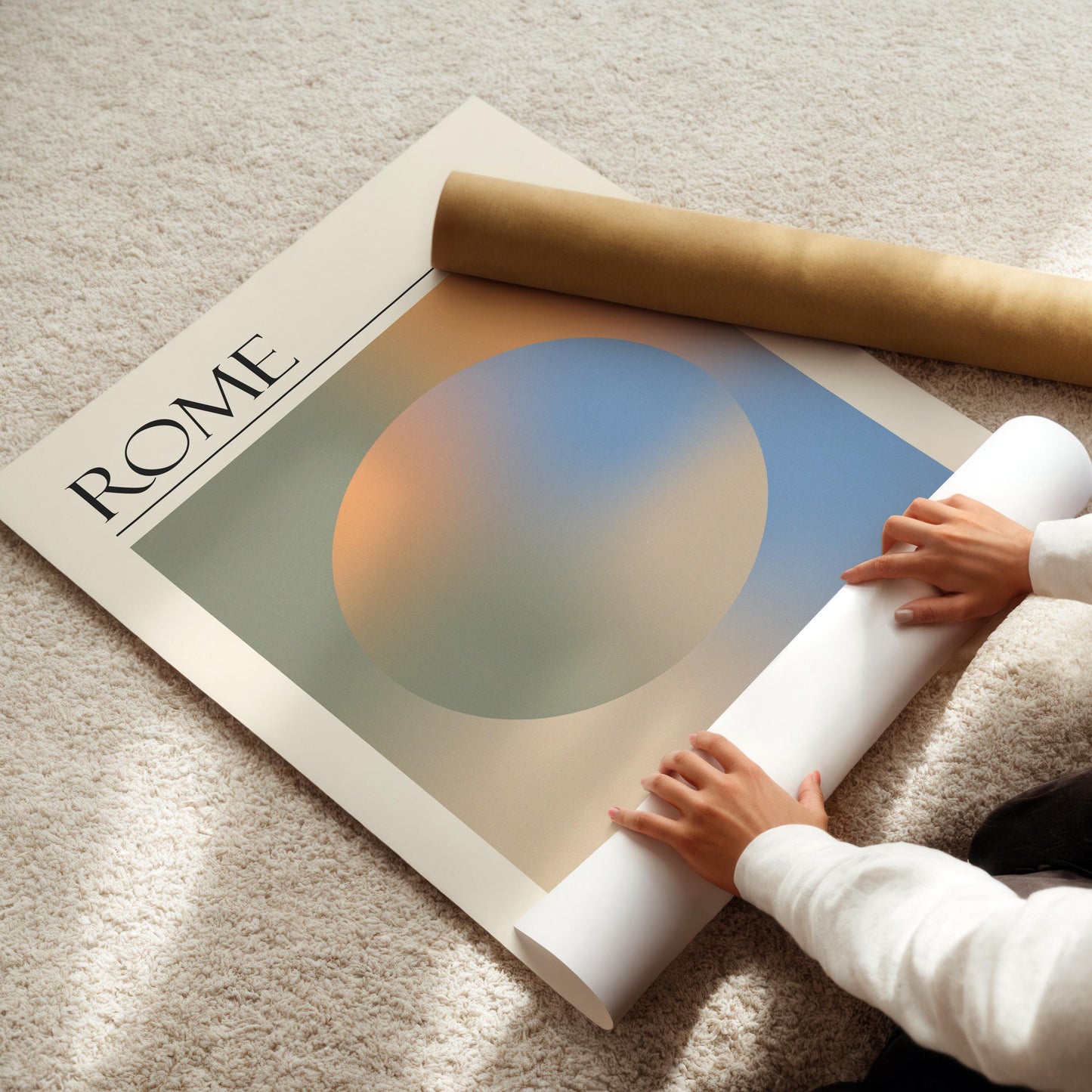 A rolled-up white poster and a brown cardboard tube are also visible. The travelling inspired print is for lovers of spiritual design and calm art.