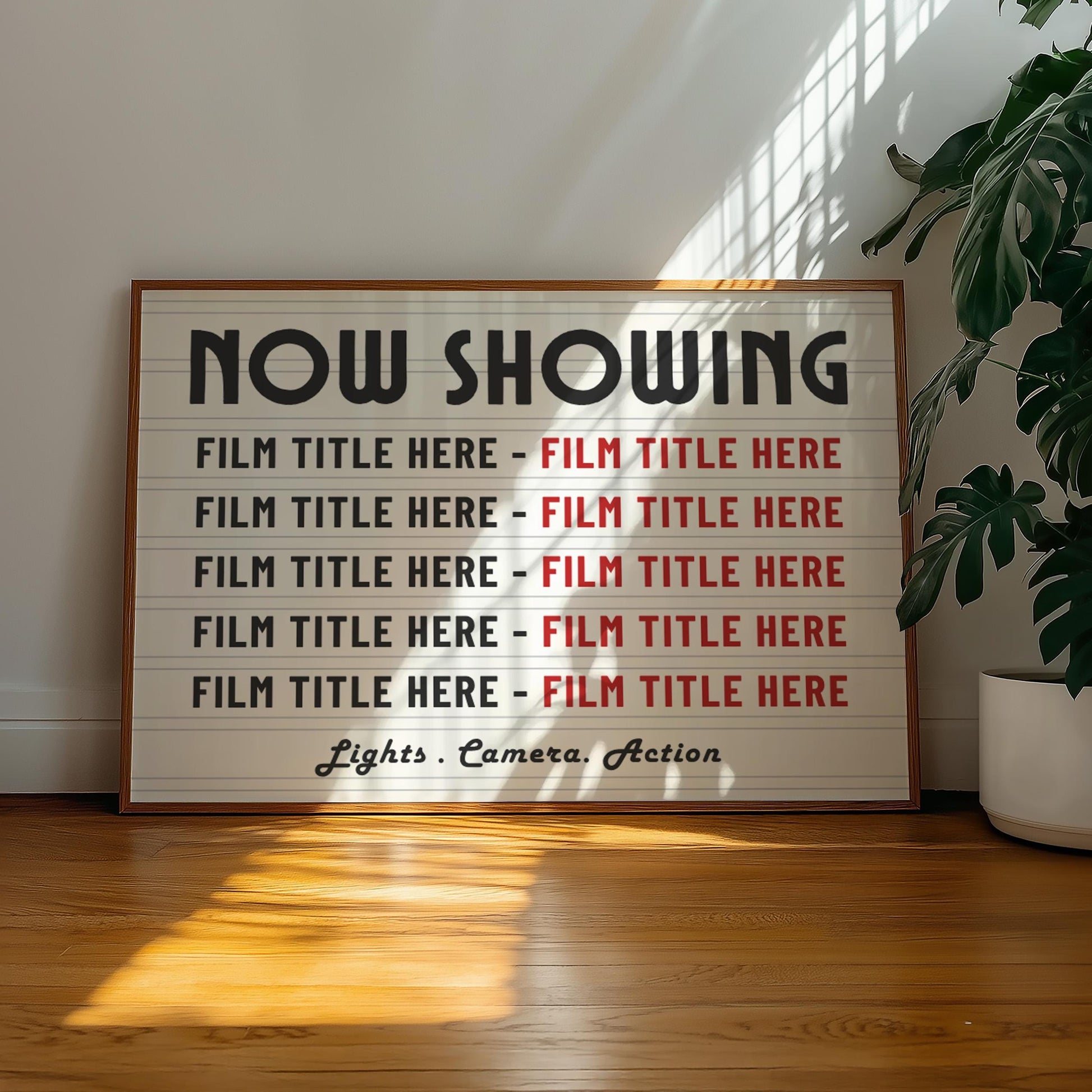 A well lit living room with a vintage poster on the wall saying "NOW SHOWING" and listings of custom movie titles. The art says "Lights. Camera. Action" and is a perfect addition to a home cinema or theatre