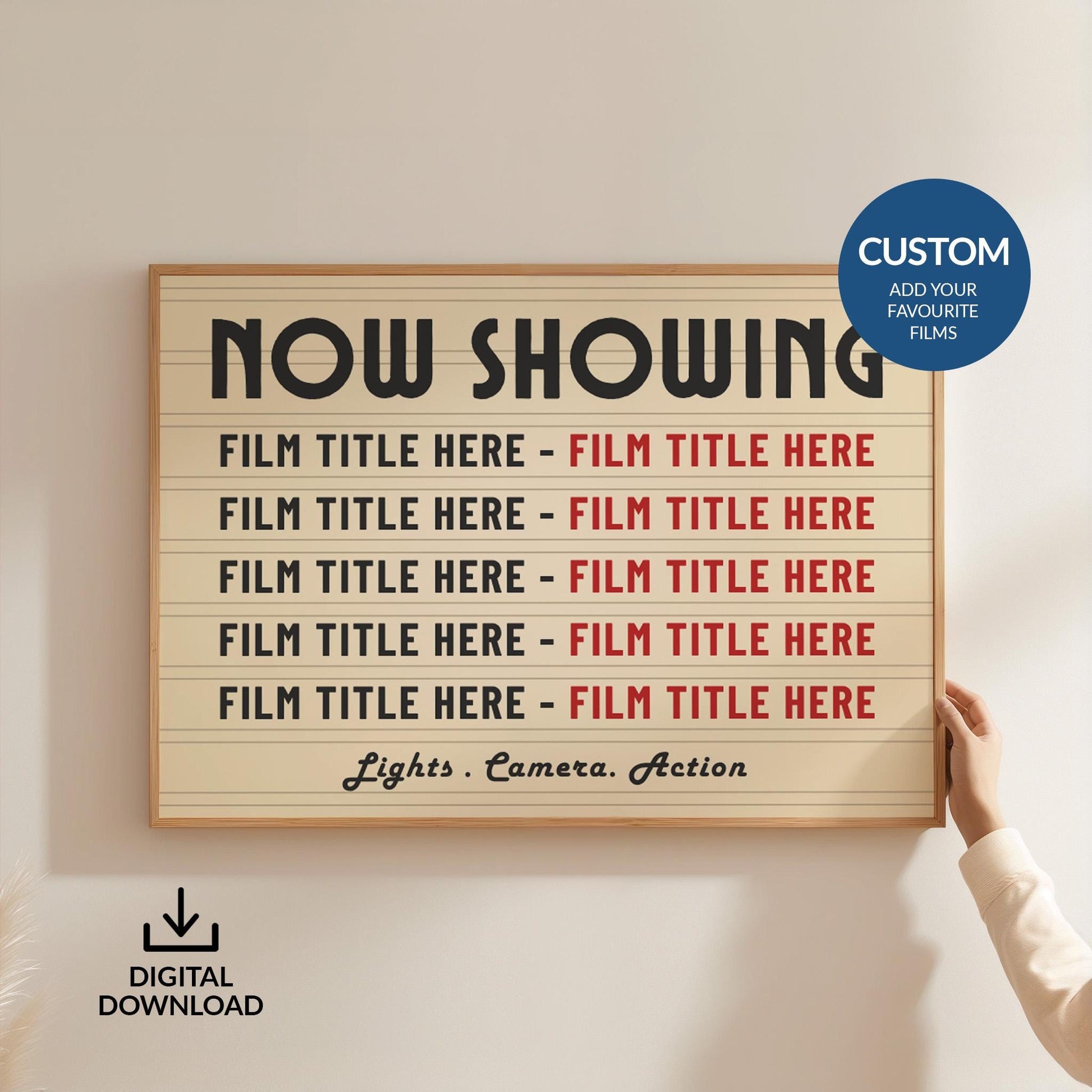 A person holding up a large framed landscape vintage movie print, customised with up to 10 bespoke film titles.