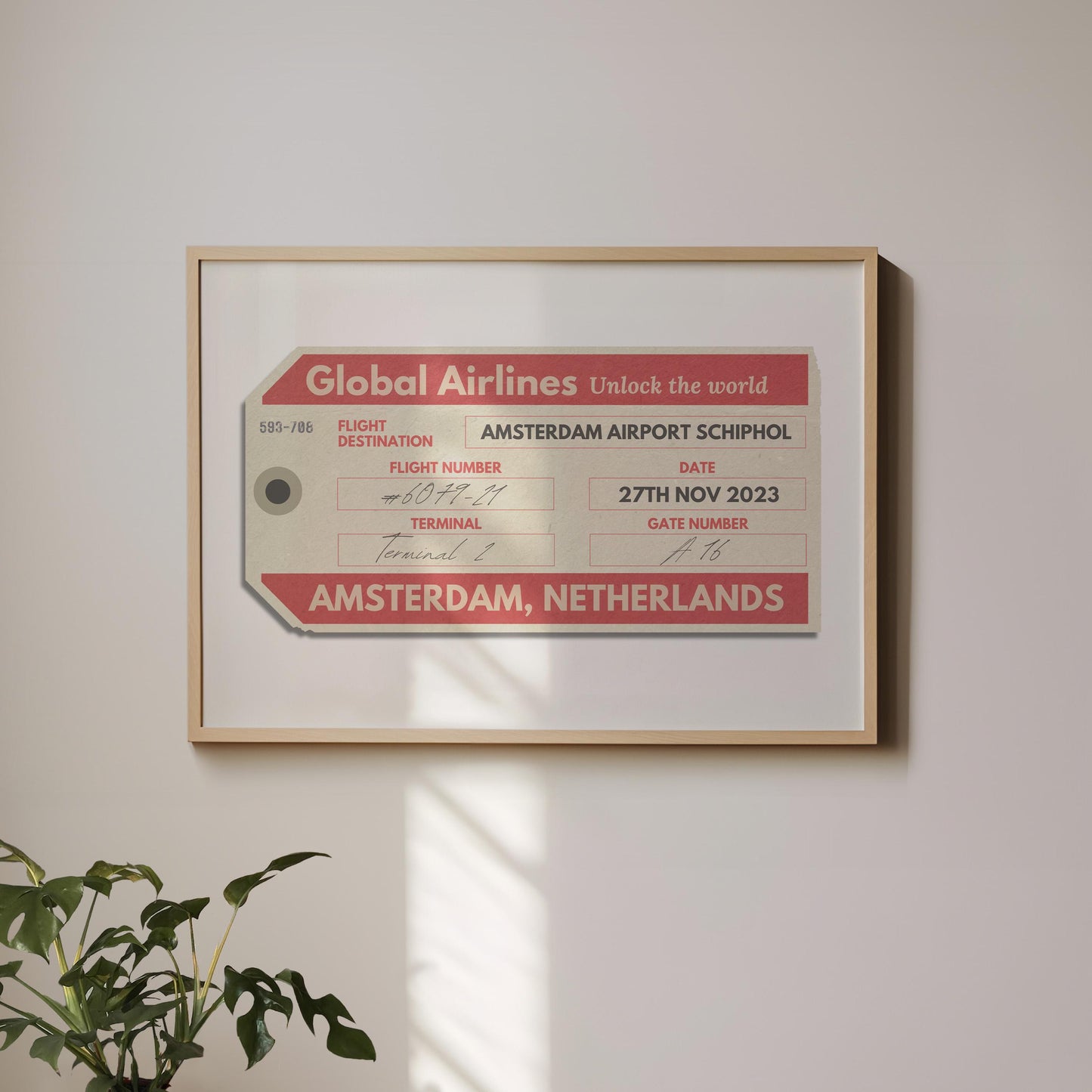 A minimalist home with a large landscape gallery wall piece hung up. The art has vintage details inspired by a retro luggage tag
