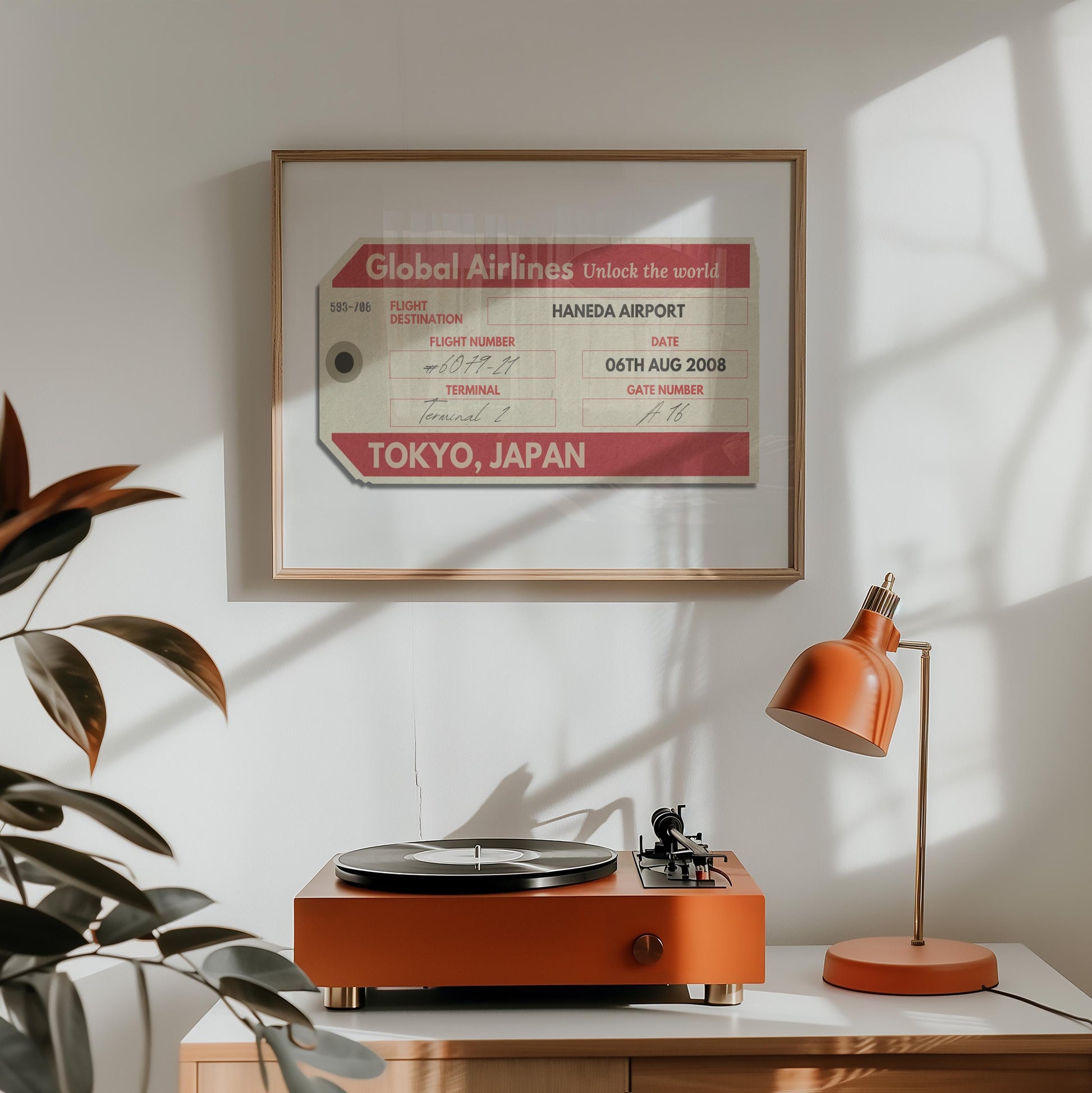 A home living room with a record player and orange lamp. On the wall is a keepsake style flight tag with a retro red colour old tag