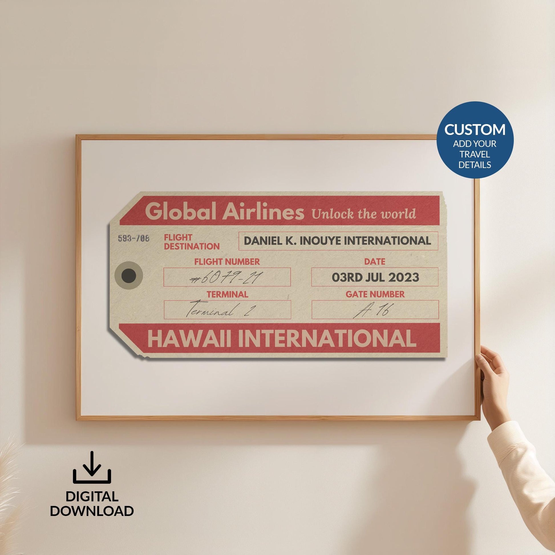 Someone in a white shirt holding up a poster is in a wood frame showing an old luggage tag design in red which has been made bespoke with personalised text.