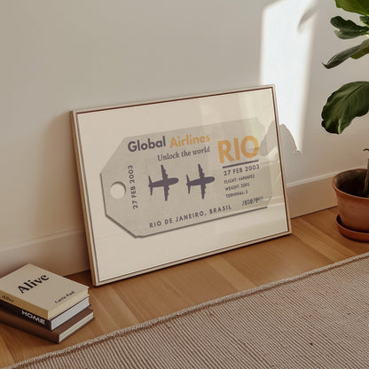 A cosy livingroom with a horizontal wall art piece. The poster shows a retro boarding pass ticket with an airport code, date and airport on it.