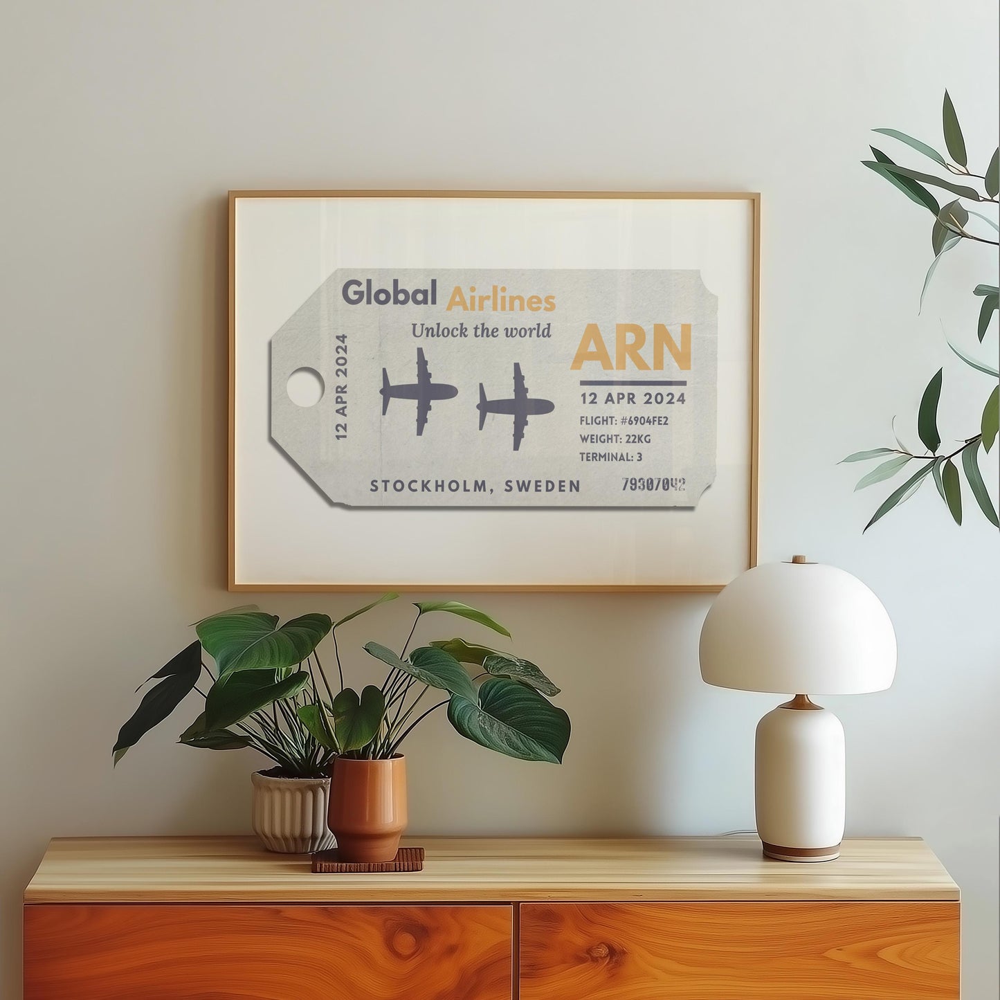 A wood dressed with a lamp plant and poster hung on the wall above. The art is an aviation tag from an airport with plane graphics, rustic edges and worn details like an old ticket.