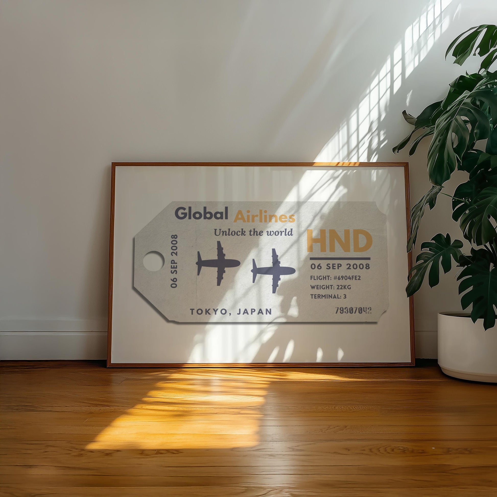 A minimalist home with a large landscape gallery wall piece on the floor. The art has vintage details inspired by a retro luggage tag