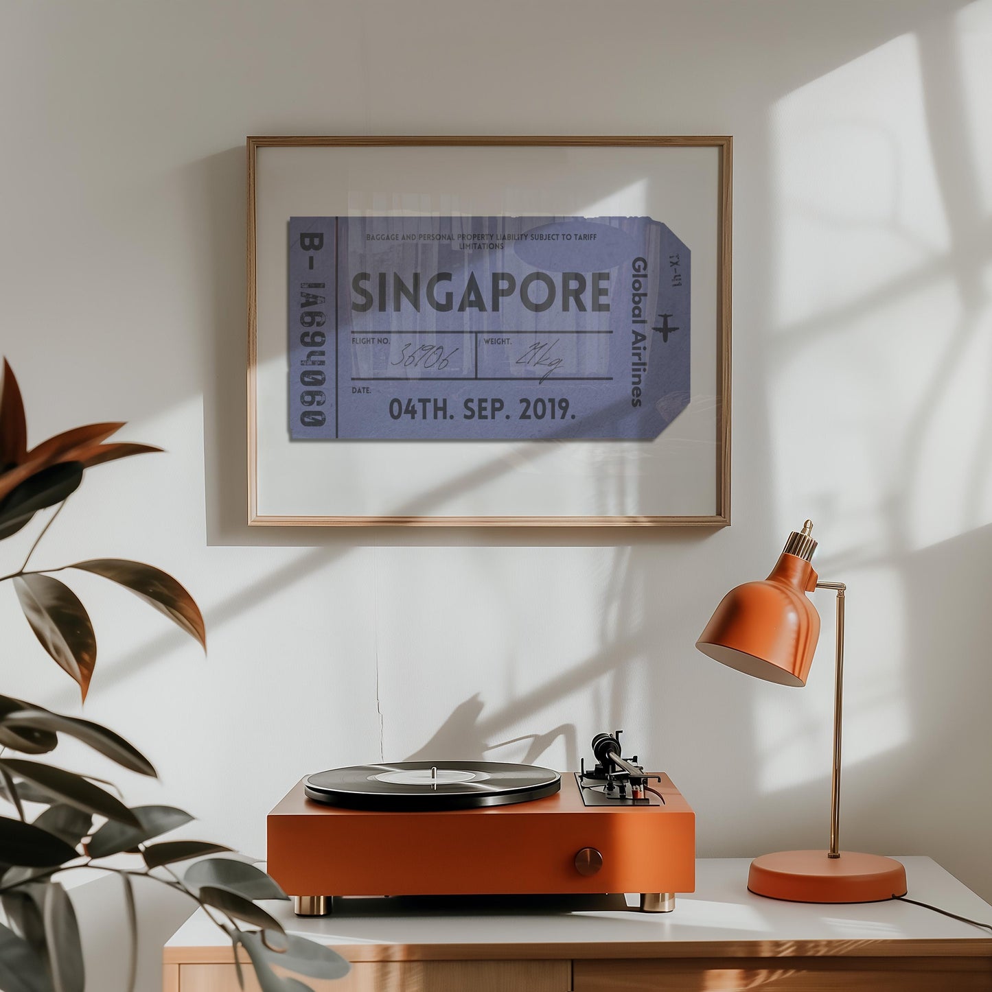A home living room with a record player and orange lamp. On the wall is a keepsake style flight tag with a retro blue colour old tag
