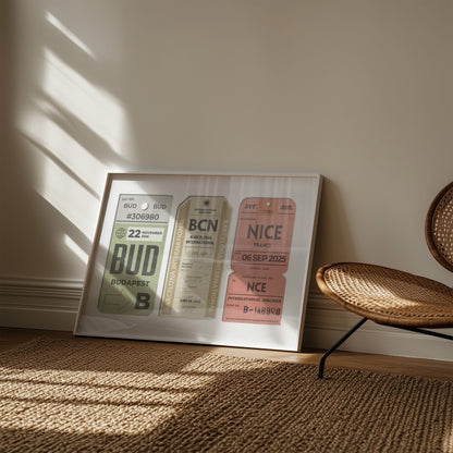 A cosy bedroom with rattan rug and chair with art leaning on the wall. The art is a personalised keepsake of a trio of luggage tags with custom details on them