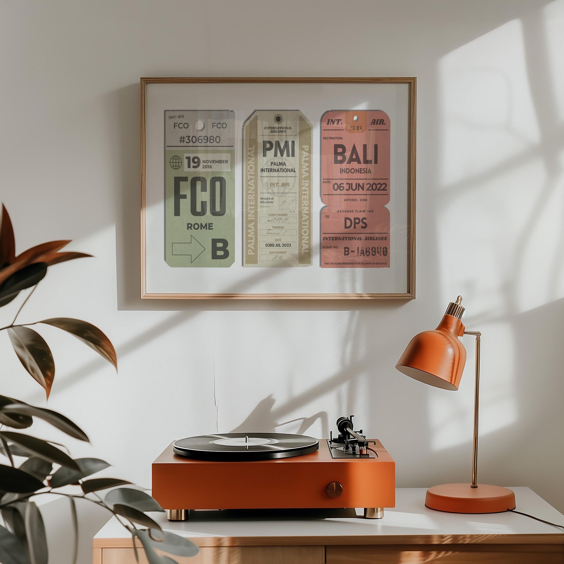 A home living room with a record player and orange lamp. On the wall is a keepsake style flight tag design with three retro colour old tags