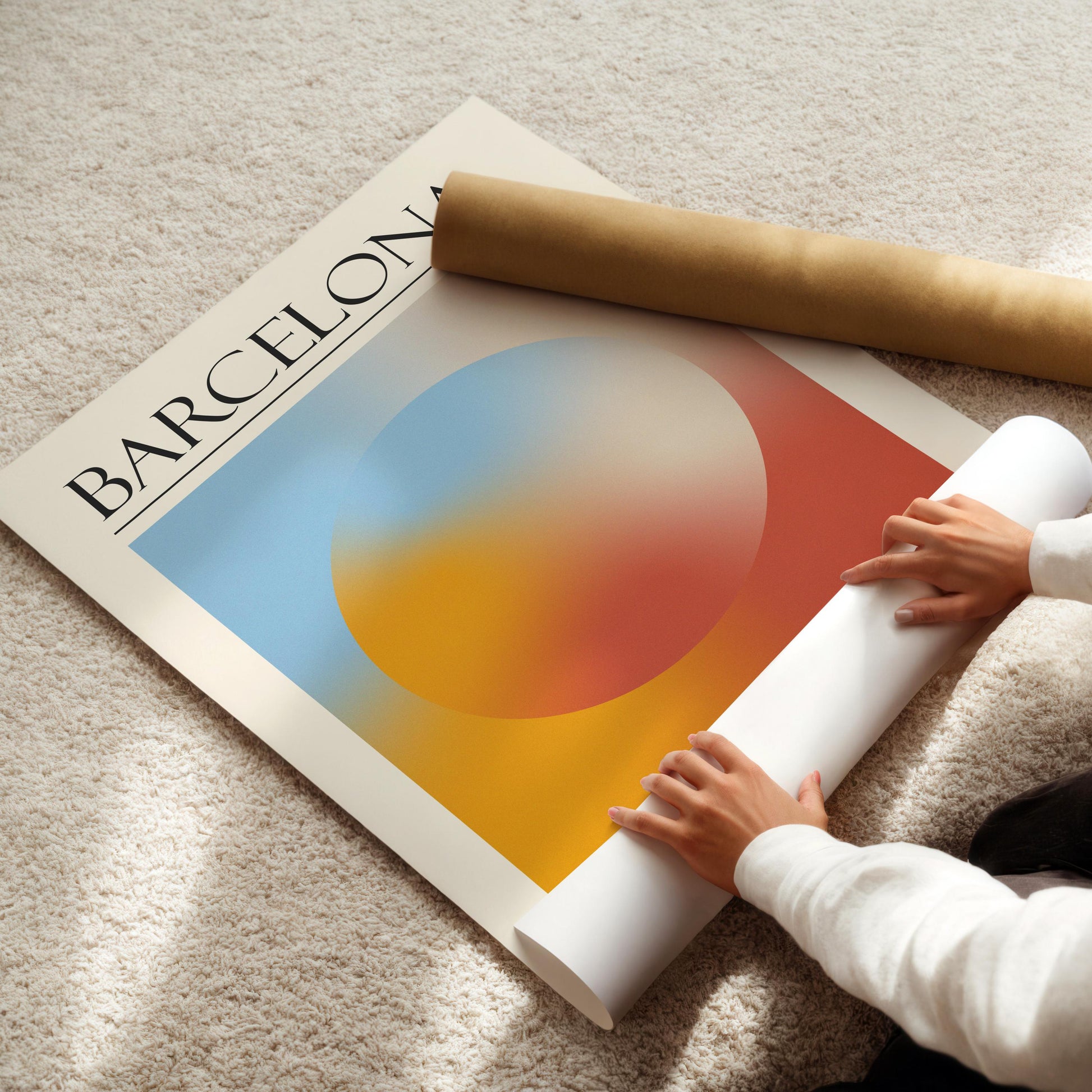 A rolled-up white poster and a brown cardboard tube are also visible. The travelling inspired print is for lovers of spiritual design and calm art.