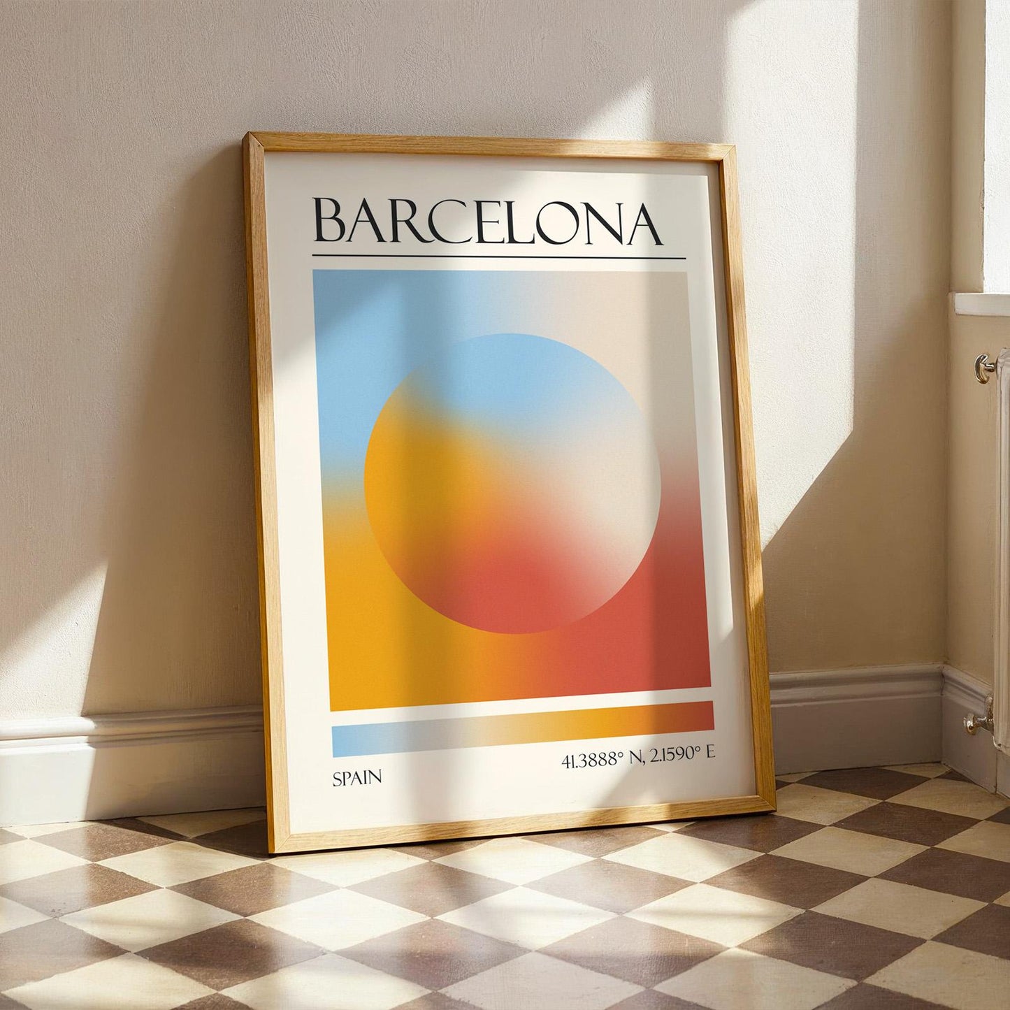 A framed print with the word "BARCELONA" at the top. The modern location artwork features orange and teal in an abstract style as colours of Barcelona. The bottom of the print reads "SPAIN" and includes coordinates.