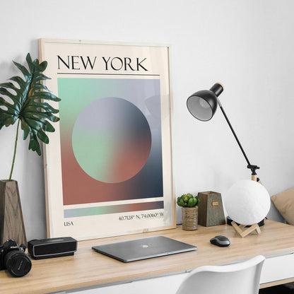 An abstract print is on a wooden desk, with a black desk lamp and a moon-shaped light in a masculine home office. The art gives a zen modern aesthetic.