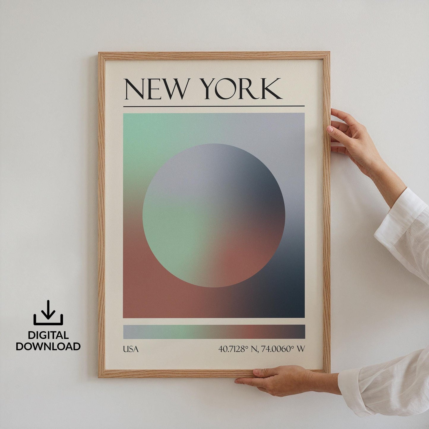 Someone in a white top holding up a framed print on the wall. The art is a destination travel poster inspired by spiritual aura colours inspired by the location such as New York.