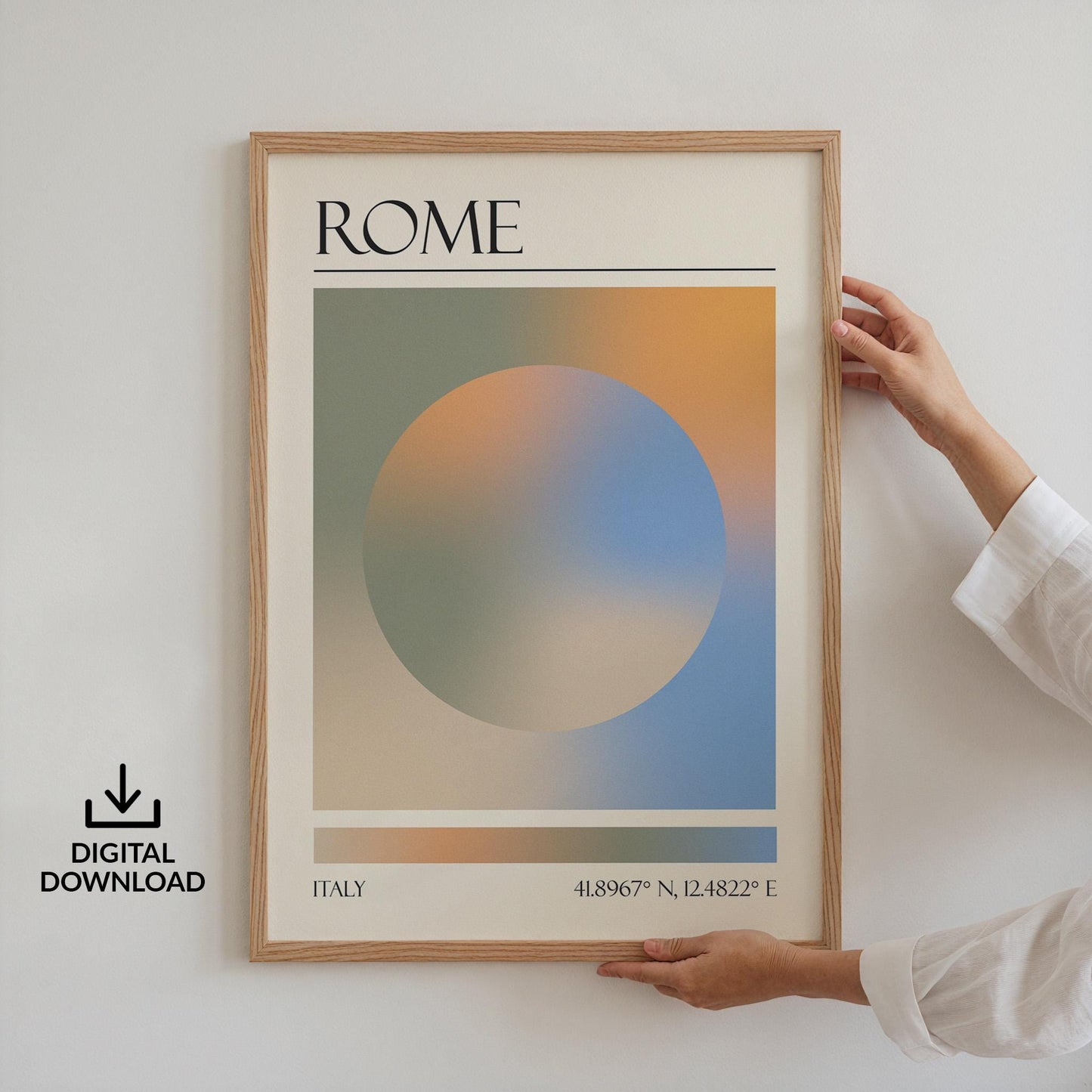 Someone in a white top holding up a framed print on the wall. The art is a destination travel poster inspired by spiritual aura colours inspired by the location such as Rome.