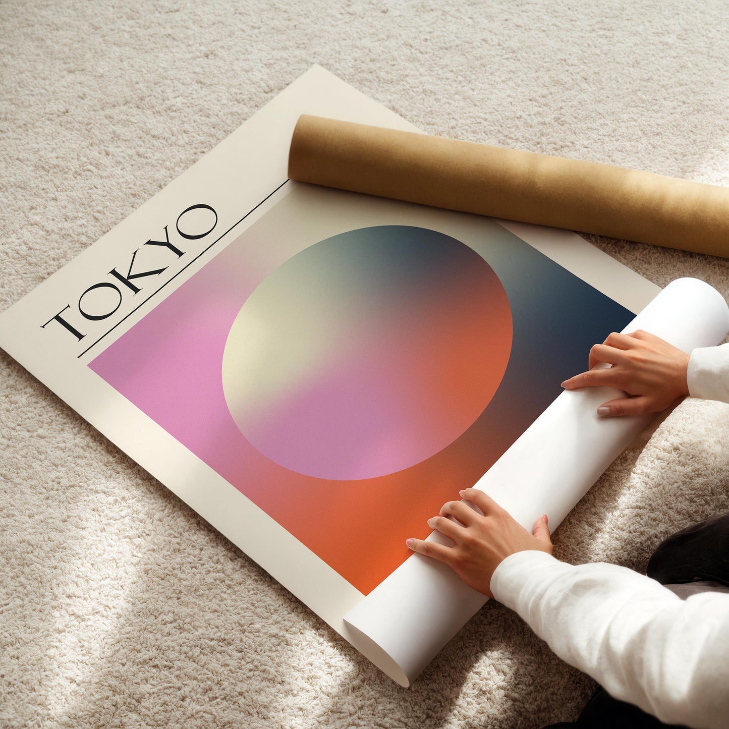 A rolled-up white poster and a brown cardboard tube are also visible. The travelling inspired print is for lovers of spiritual design and calm art.
