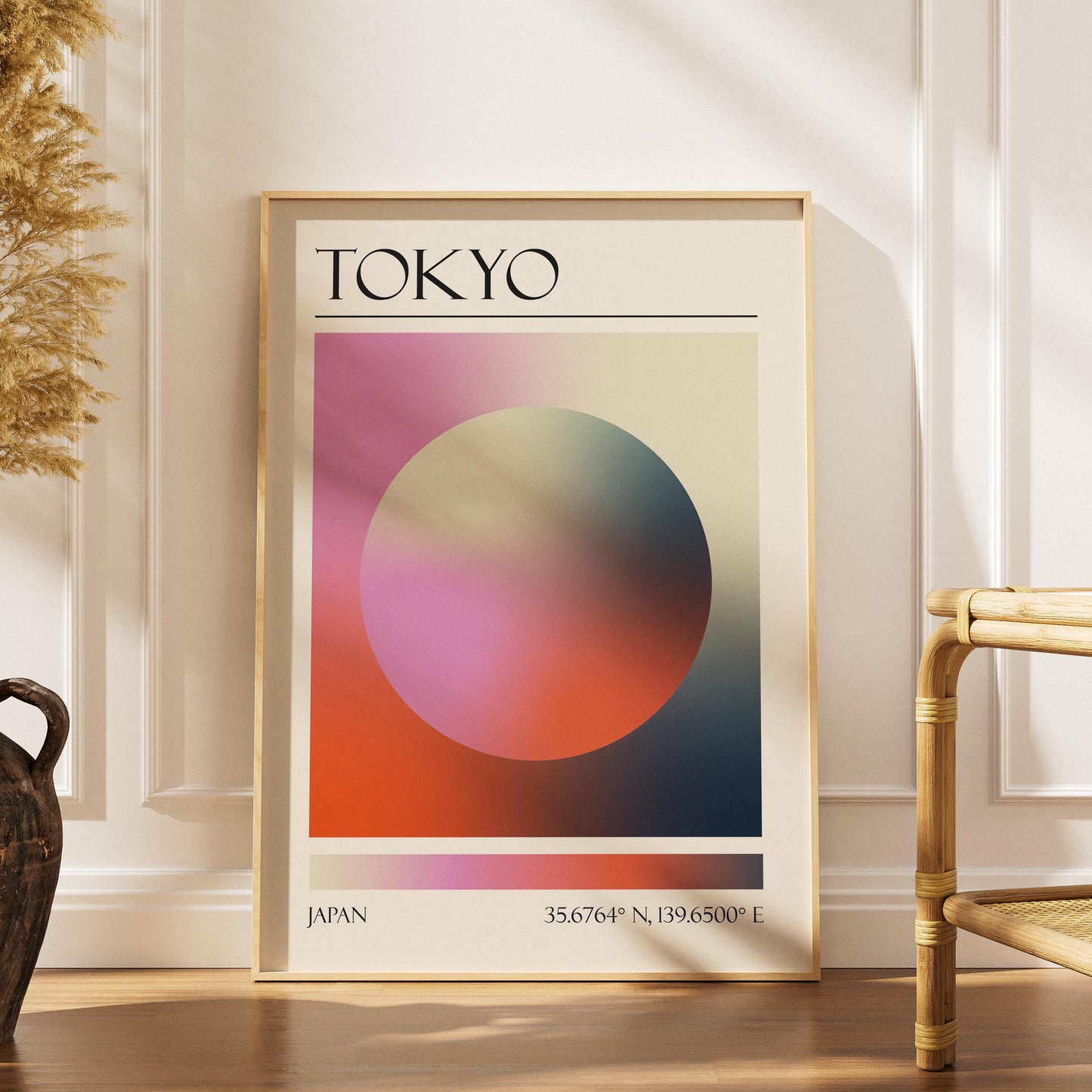A boho scandi style home living room with a colourful poster leaning on the wall. The art is a dopamine decor style aura print with the colours of Tokyo.