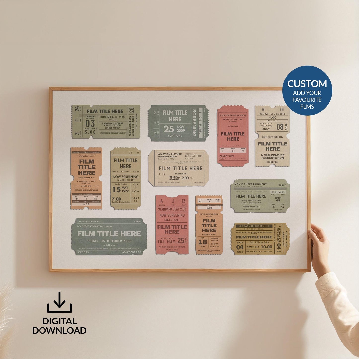Someone in a white blouse holing up a horizontal framed art piece on the wall. It is a muted tone vintage style cinema ticket stub print with chosen films.