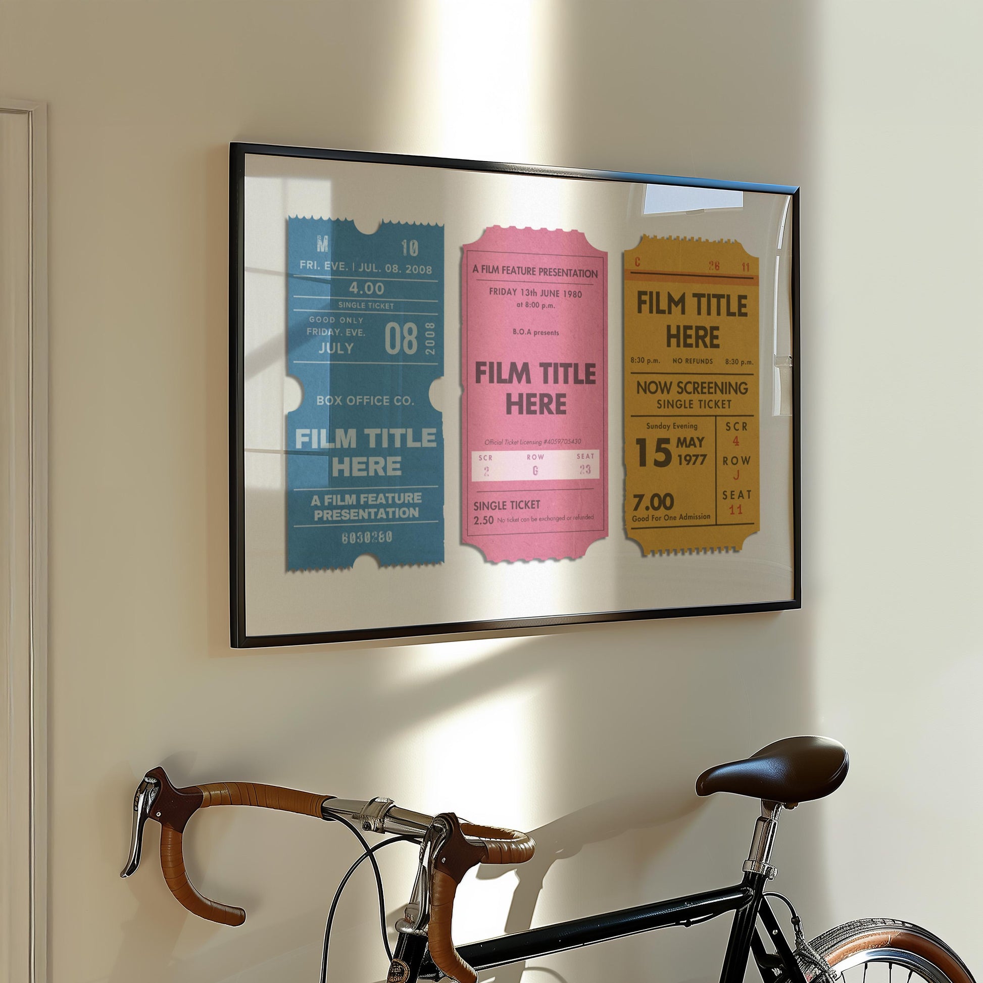 A Parisian style apartment hallway with a large landscape poster on the wall. The art shows worn vintage cinema passes in blue, pink and yellow.