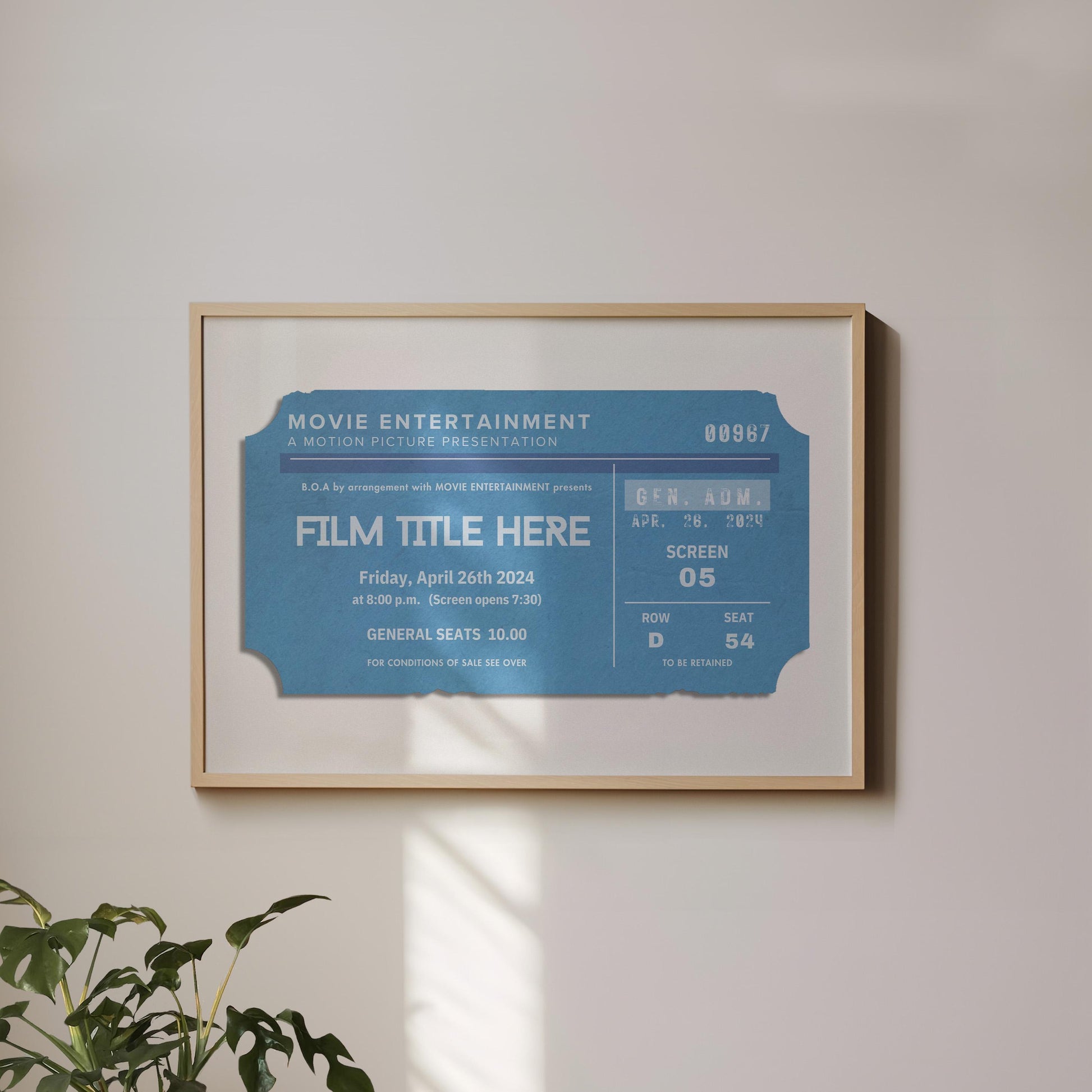A landscape framed art print hung on a white wall. The poster has a vintage movie ticket on it in a blue tone showing a unique film with date and production.