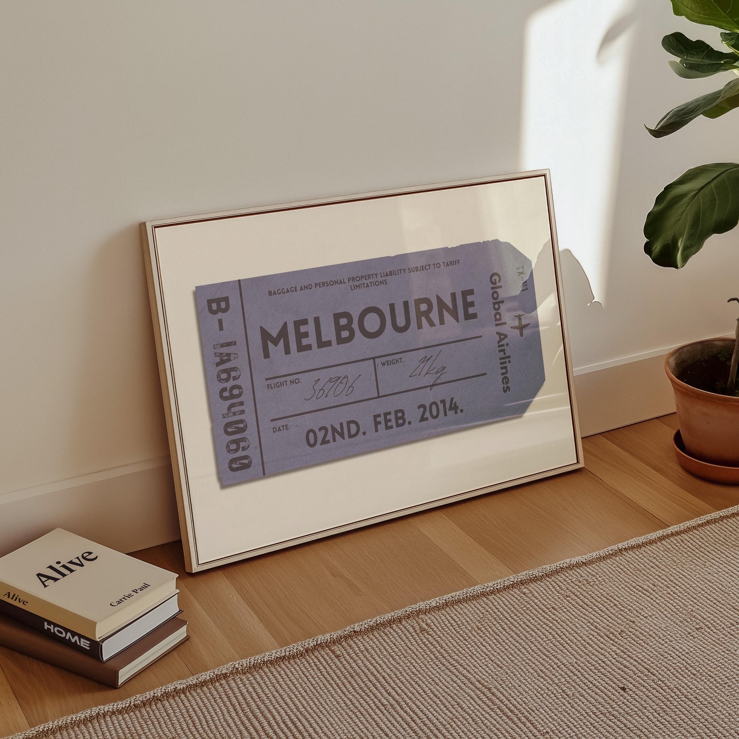 A cosy livingroom with a horizontal wall art piece. The poster shows a retro boarding pass ticket with an airport code, date and airport on it.