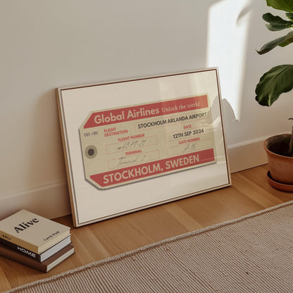 A cosy livingroom with a horizontal wall art piece. The poster shows a retro boarding pass ticket with an airport code, date and airport on it.