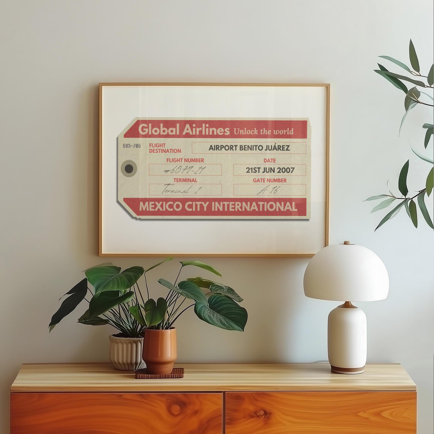 A wood dressed with a lamp plant and poster hung on the wall above. The art is an aviation tag from an airport with plane graphics, rustic edges and worn details like an old ticket.