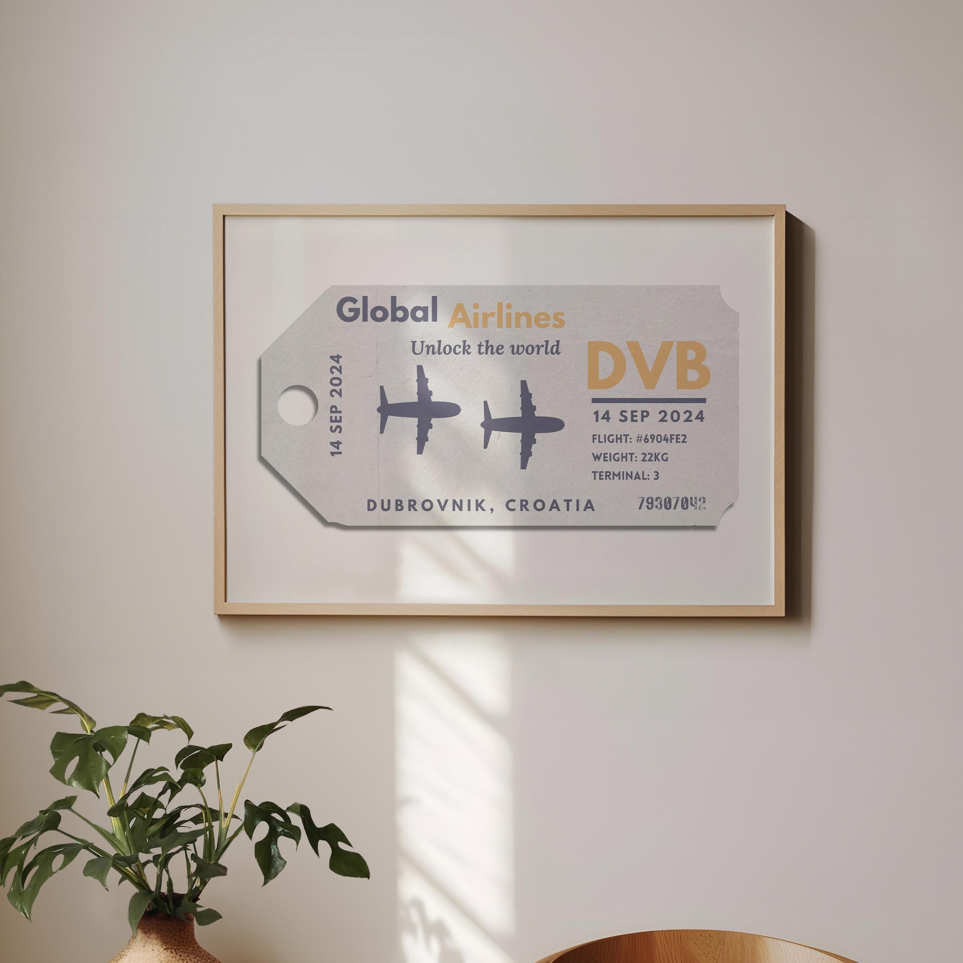 A minimalist home with a large landscape gallery wall piece hung up. The art has vintage details inspired by a retro luggage tag