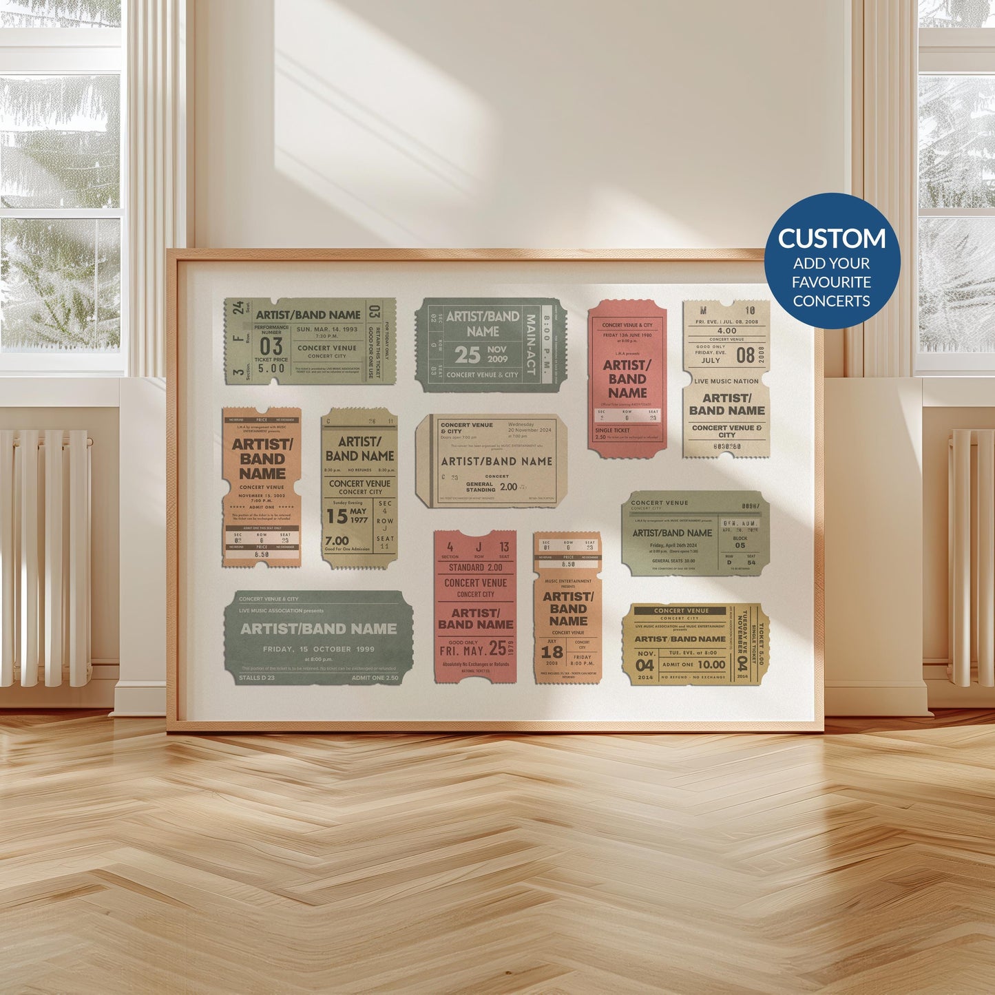 A scandi modern apartment with a large horizontal print leaning on the wall. The art is of multiple vintage concert ticket stubs with personalised text on them.