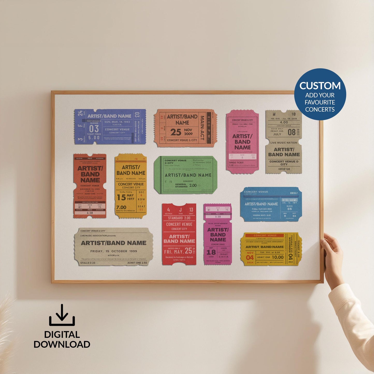 Someone in a white top holding up a large horizontal framed poster on a wall. The art is of multiple vintage concert ticket stubs with personalised text on them.
