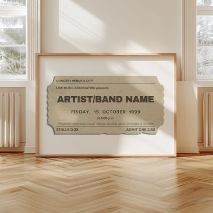 A scandi modern apartment with a large horizontal print leaning on the wall. The art is of a vintage concert ticket stub with personalised text on them.