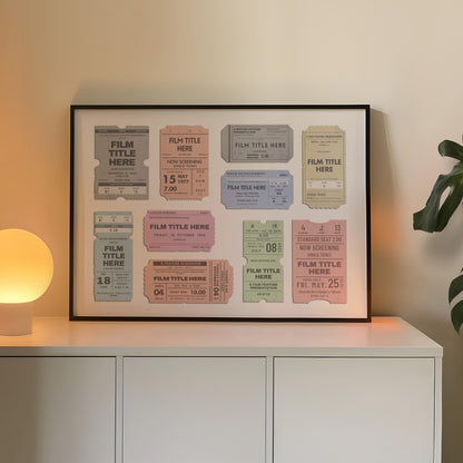 A well lit Livingroom with warm wood floor and a large horizontal frame leaning on the wall. The art is eclectic and bespoke made from old movie theatre tickets