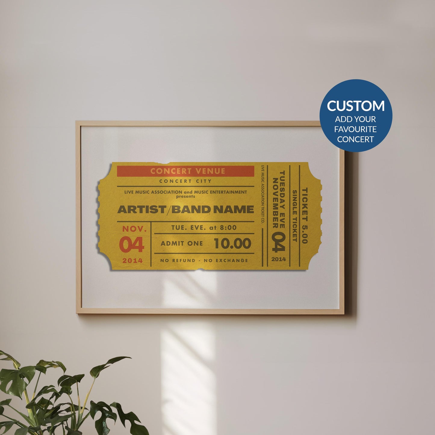 A boho minimalist dining room with a plant and wood chair. On the wall is a horizontal oak frame with a print with a muted yellow colour on it. The art is eclectic, retro and an ideal gift for music lovers.