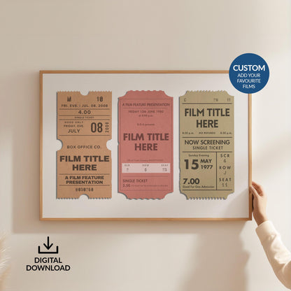 Someone holding up a framed large print on a white wall. Different shape retro style cinema tickets are shown on the design with personalised chosen film titles on them.