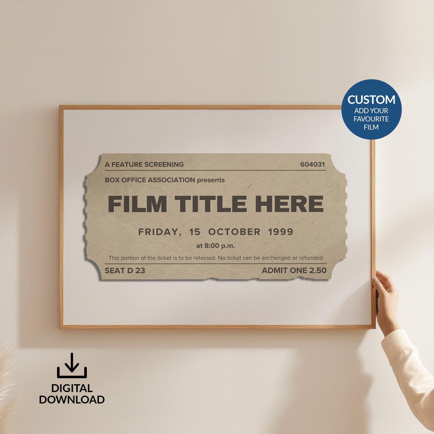 A person holding a print up on a white wall. The art is a keepsake style piece for lovers of films, cinema and nostalgia.