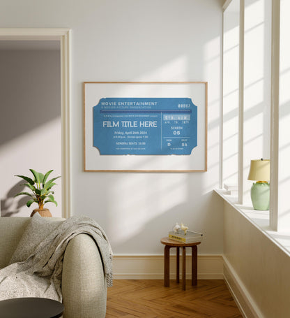 A modern white and grey family home with art on the wall. The design shows a muted blue colour large ticket stub with the title "your film here"