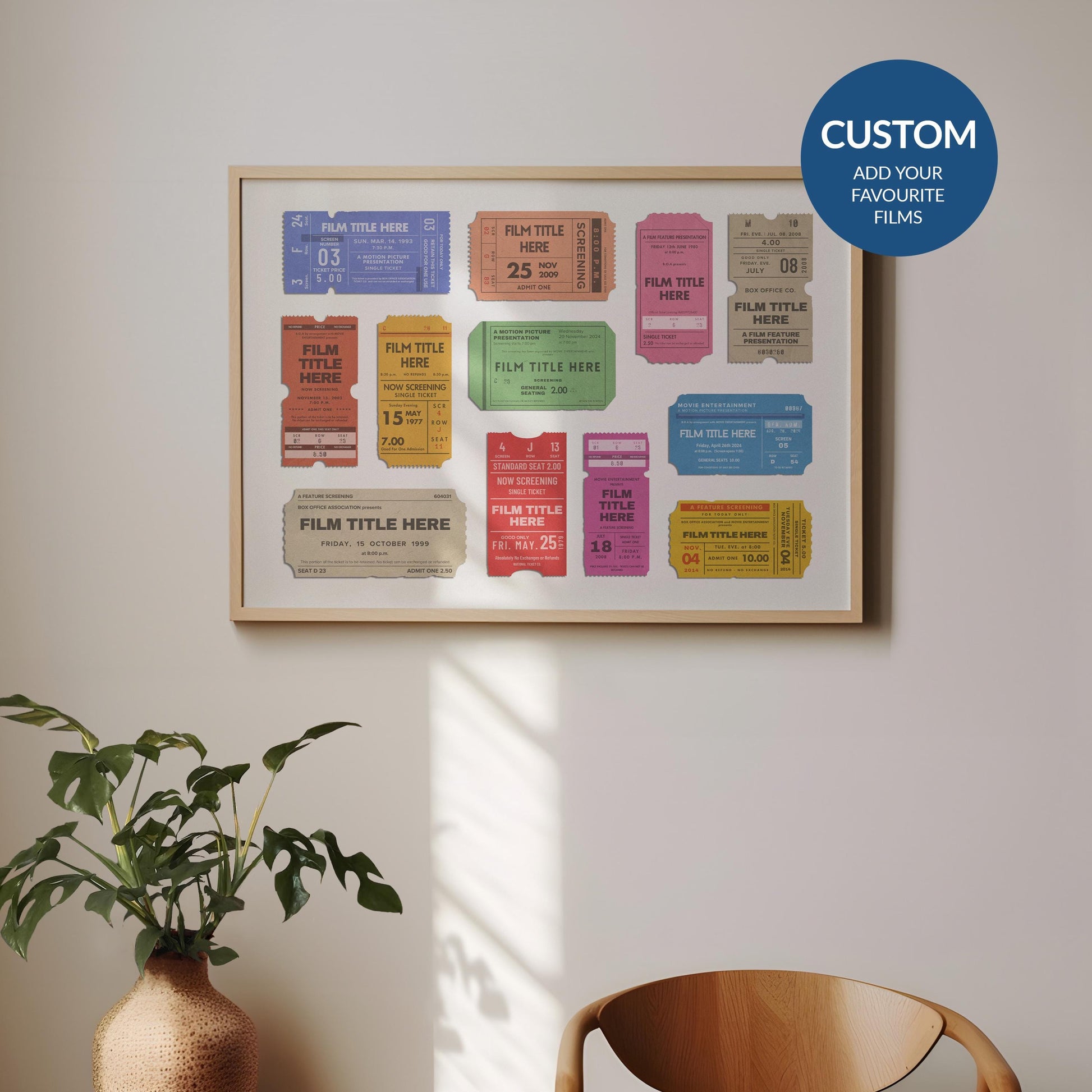A landscape framed art print hung on a white wall. The poster has vintage movie tickets on it in colourful schemes showing unique films with dates and productions.