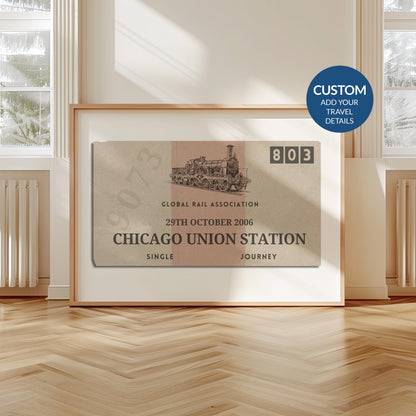 A livingroom with wood herringbone floor and a large art print. It is a custom vintage train ticket stub poster to show off your travels and holidays.