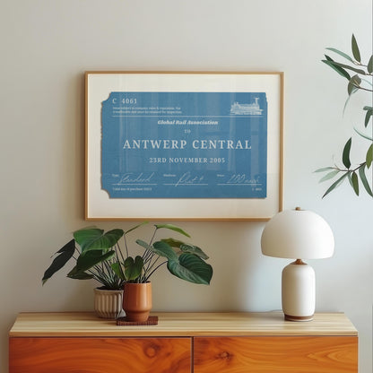 A scandinavian style home with a wood framed poster on the wall which shows a personalised train ticket stub on it. The art is vintage, rustic and bespoke.