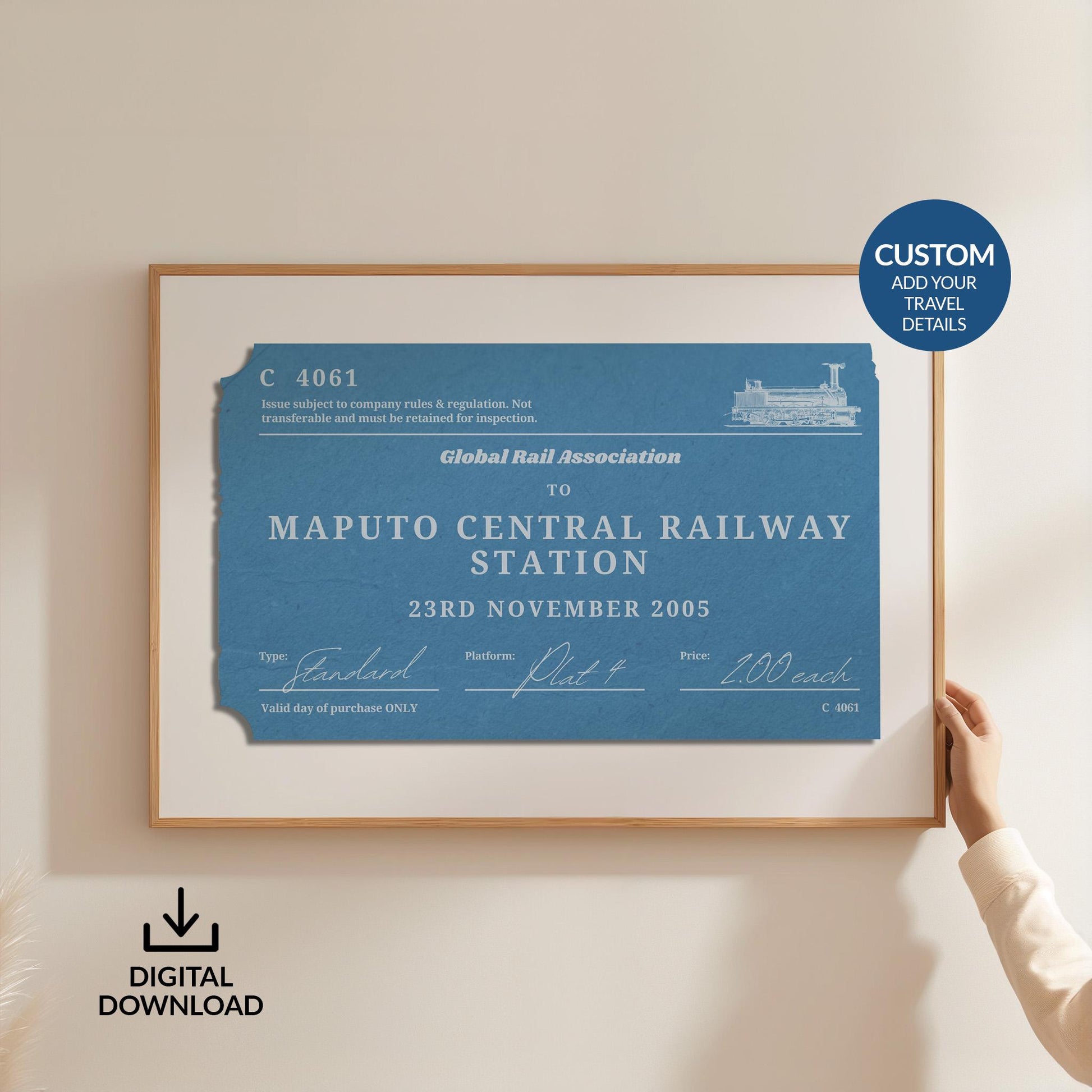 Someone holding up a framed print of a personalised interrail luggage tag, inspired my old stubs to make a design for frequent travellers and holiday keepsake collectors