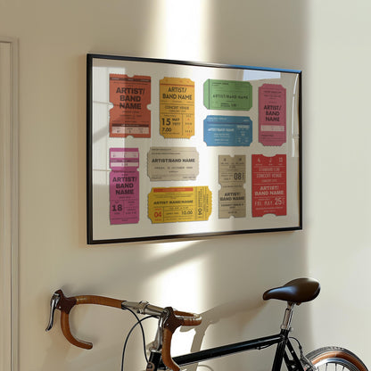 A European style apartment hallway with a bike leaning on the wall. Above isa statement art piece inspired by old concert tickets. The art shows various styles of tickets with personalised live music events on them.