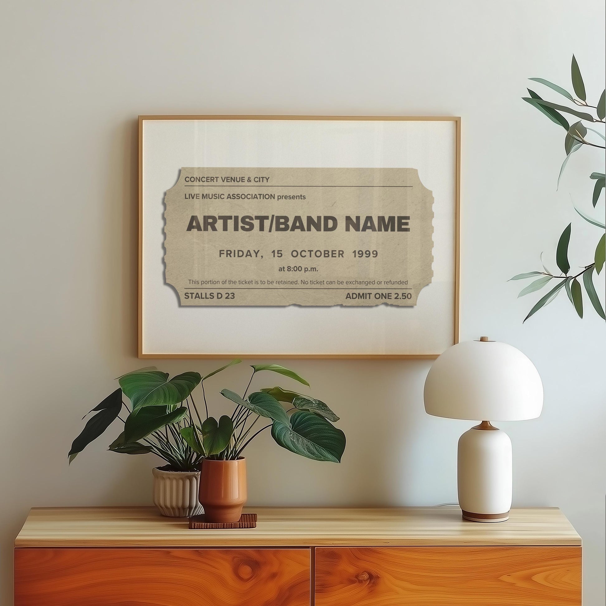 A beige old style ticket stub on a print in a bedroom. The art is minimal yet personal and fits in the modern space.