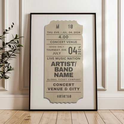 A neutral coloured retro print is framed and leaning on a panelled wall. It is inspired by concert event stubs with personalised details so make a music keepsake.
