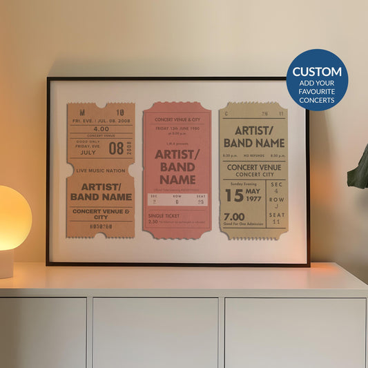 Framed festival keepsake poster with 3 personalised event stubs, leaning on a counter in a warm light.