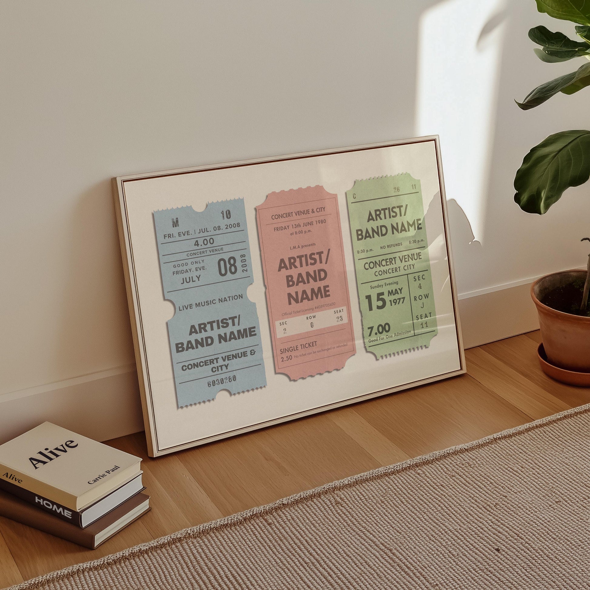 Custom concert ticket artwork with 3 stubs on one poster, it is in a horizontal frame placed on a wood floor and is a vintage design for music lovers.