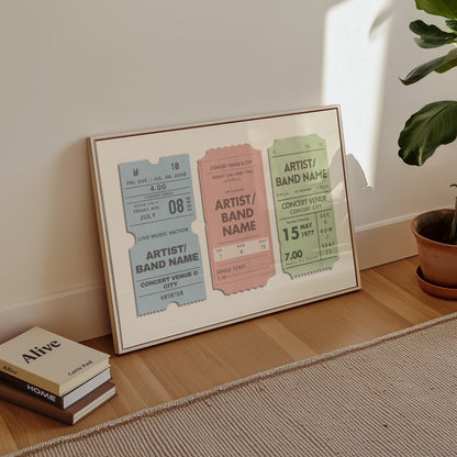 Custom concert ticket artwork with 3 stubs on one poster, it is in a horizontal frame placed on a wood floor and is a vintage design for music lovers.