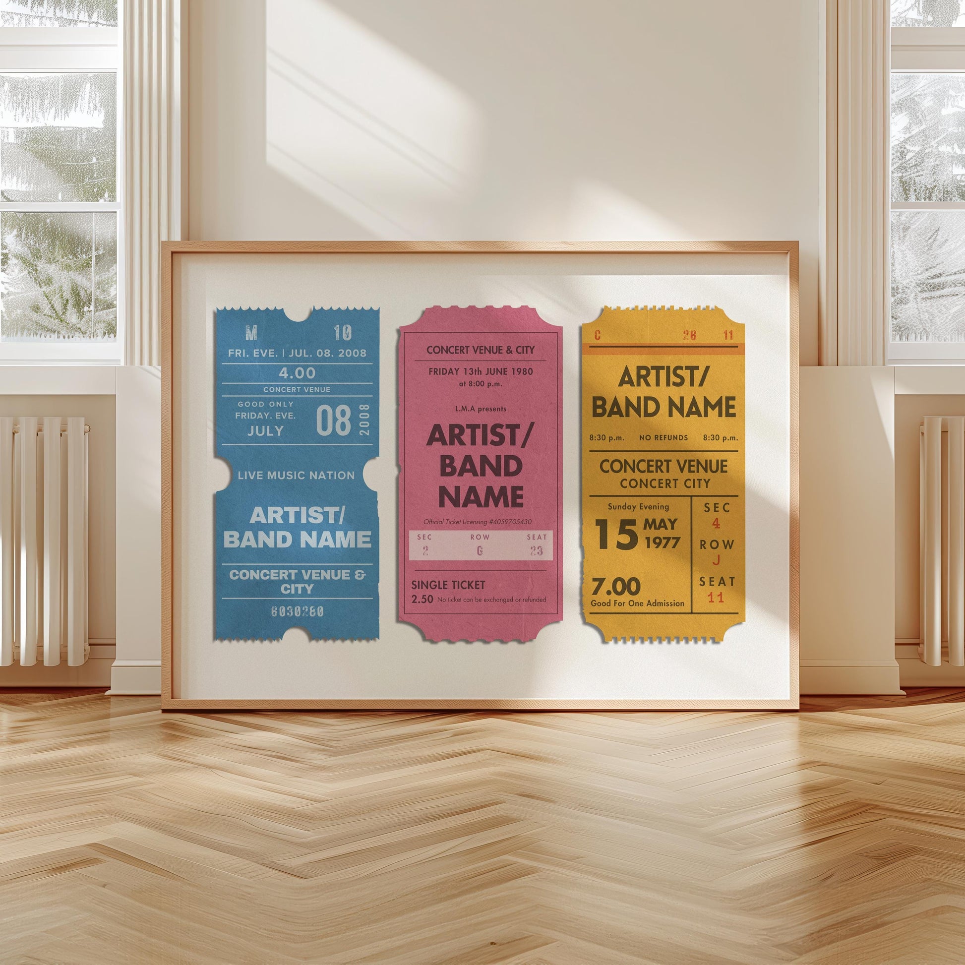 A large hallway space with wood parquet flooring. A large landscape art is leaning on the wall which shows a personalised trio of musical event art. It is a vibrant pink, blue and yellow with rustic features and vintage styling.